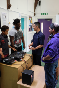 image of DJ tutor teaching session