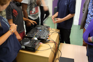 image of DJ tutor teaching session
