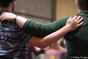 touching shoulders-chloe Coules