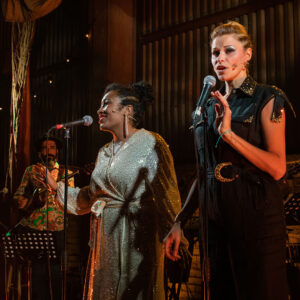 1 l-r Georgina White (Juno) and Priscille Grace (Venus) in _Dido_s Bar_