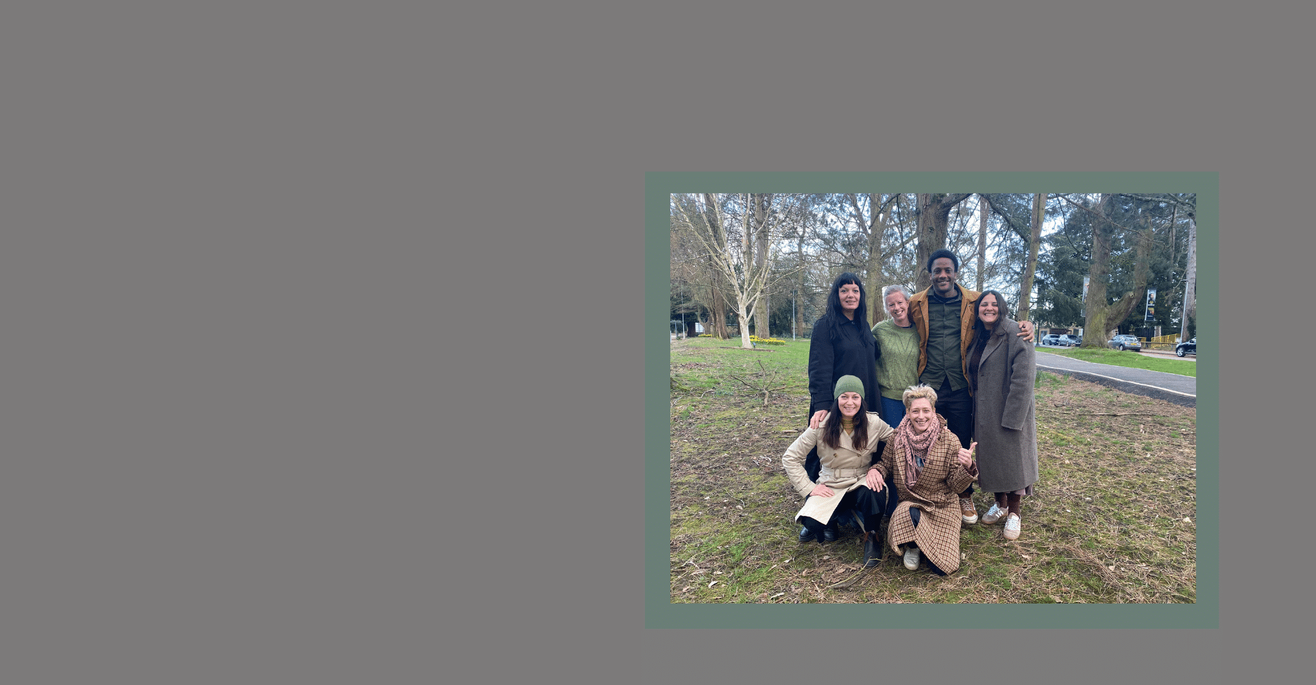 Group of BOOM artists outside on the grass