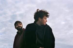 Publicity photo of duo Spafford Campbell against the sky